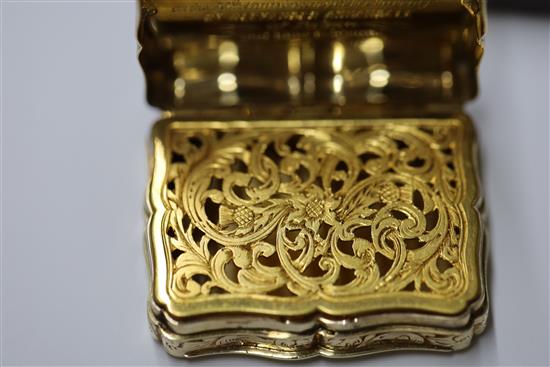 A mid 19th century unmarked gold (tests as 15ct) vinaigrette, in fitted box, 21.1 grams.